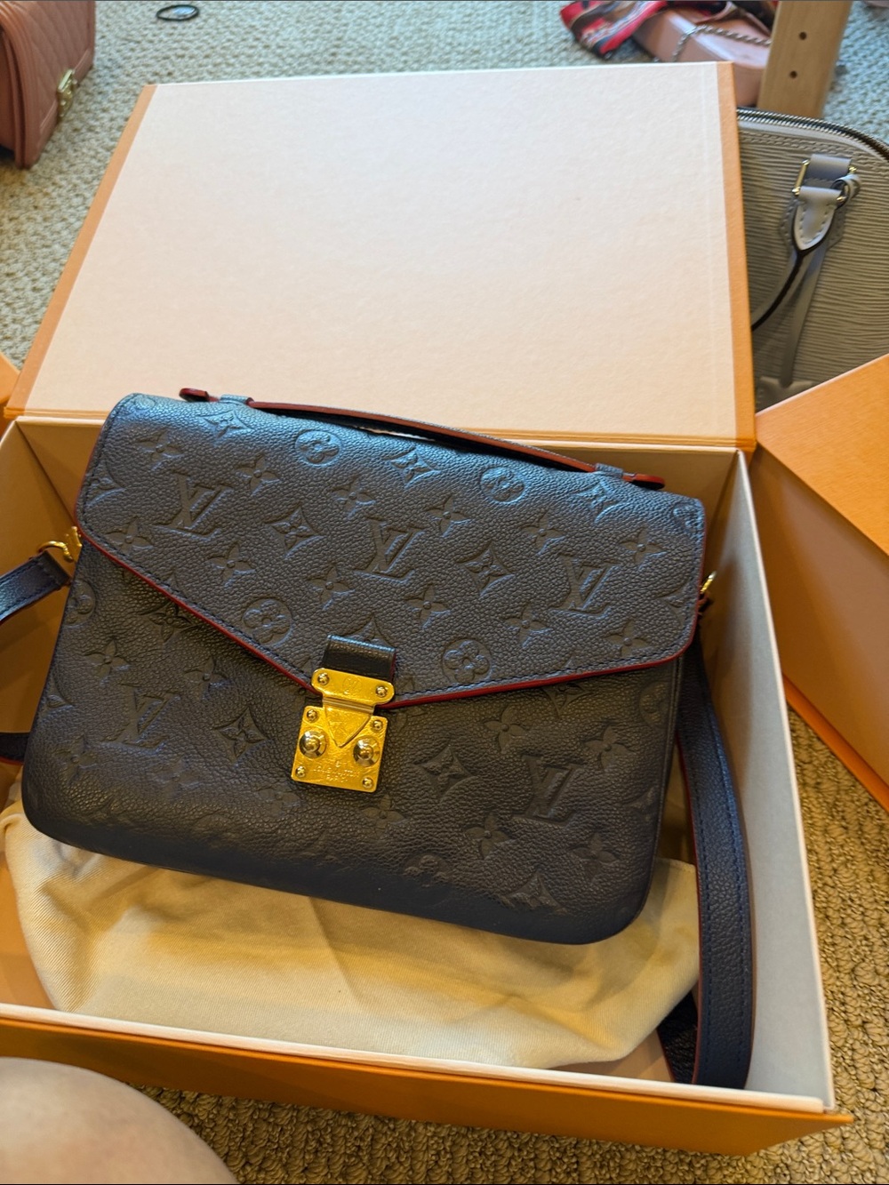 Louis Vuitton Black Embossed Monogram Messenger Bag with Red Trim